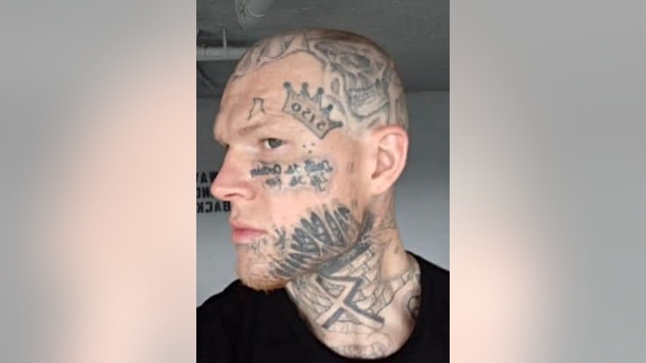 Bobby East stabbing suspect Trent William Millsap shows off his tattoos.