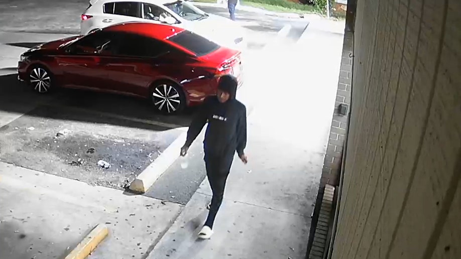 Still from surveillance video showing suspect