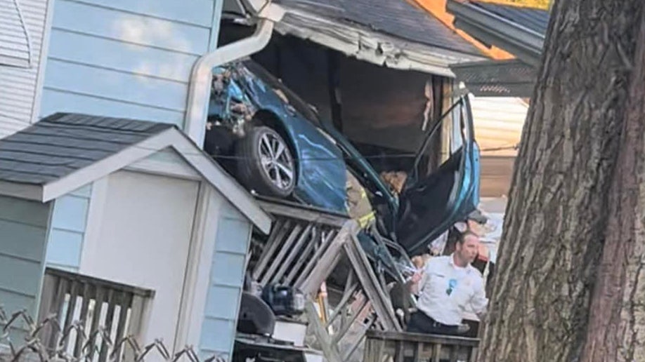 Car crashes into home stopping just inches from sleeping homeowner - CBS  Chicago