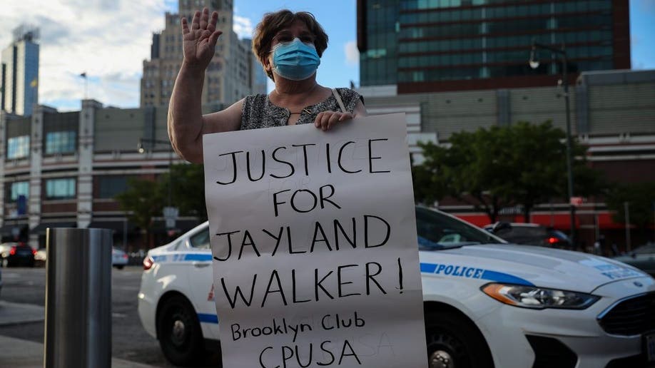 Jayland Walker protestor sign