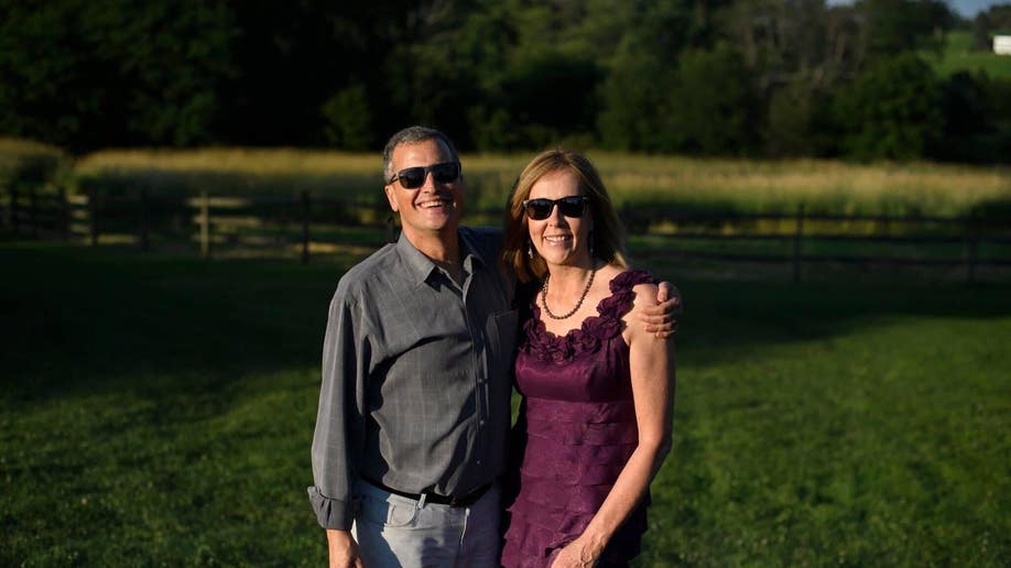 Marc Fogel smiling with his wife, Jane