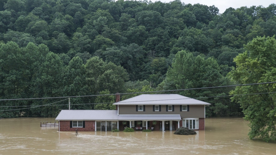 Home damaged by floodwaters