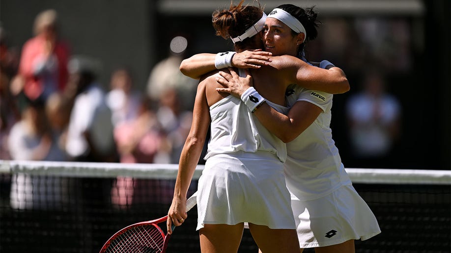 Ons Jabeur and Tatiana Maria embrace after match