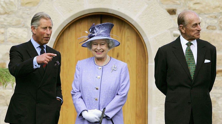 Queen Elizabeth II with Prince Philip and their son Prince Charles in 2006