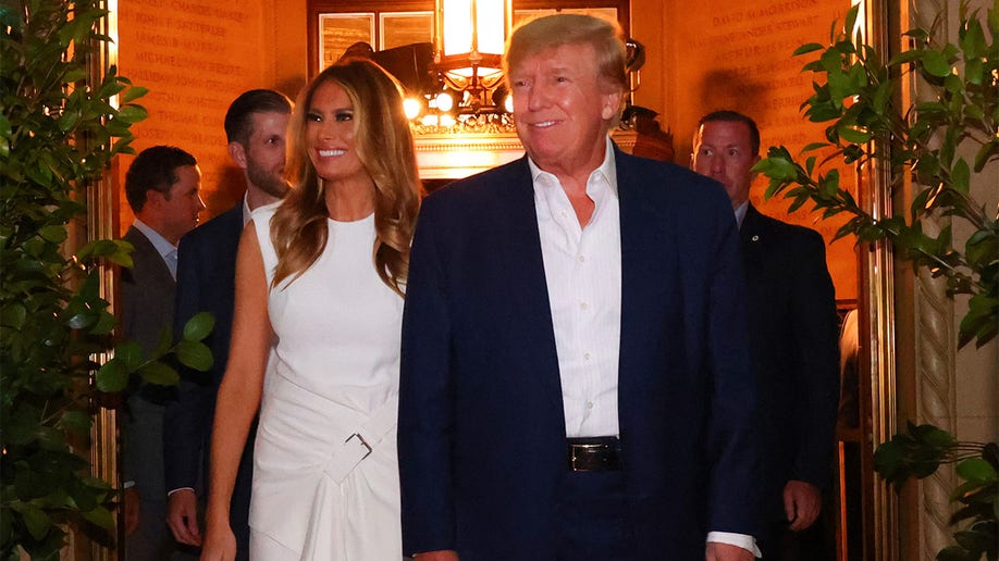 Donald Trump and Melania Trump arrive to the welcome party