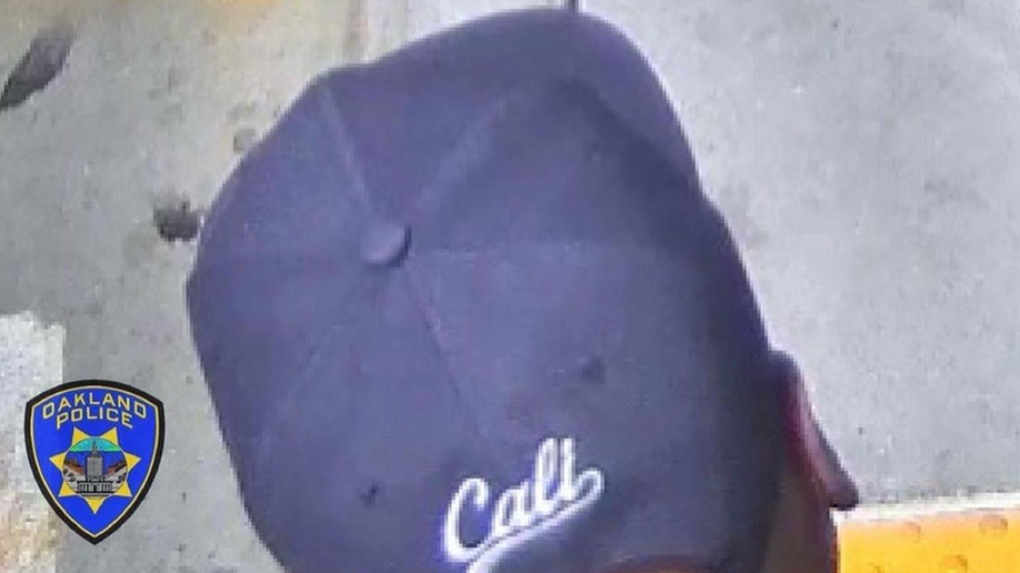 Oakland man wearing a Cali hat