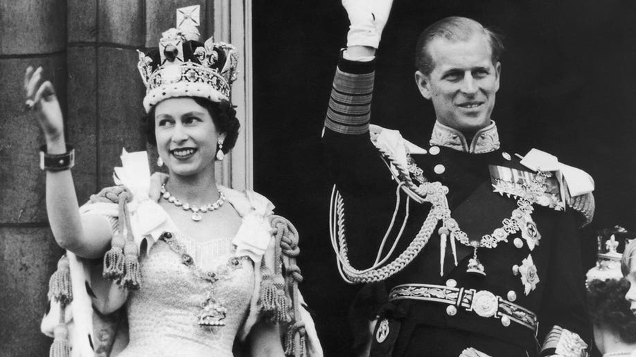 Queen Elizabeth II at her Coronation alongside young Prince Philip