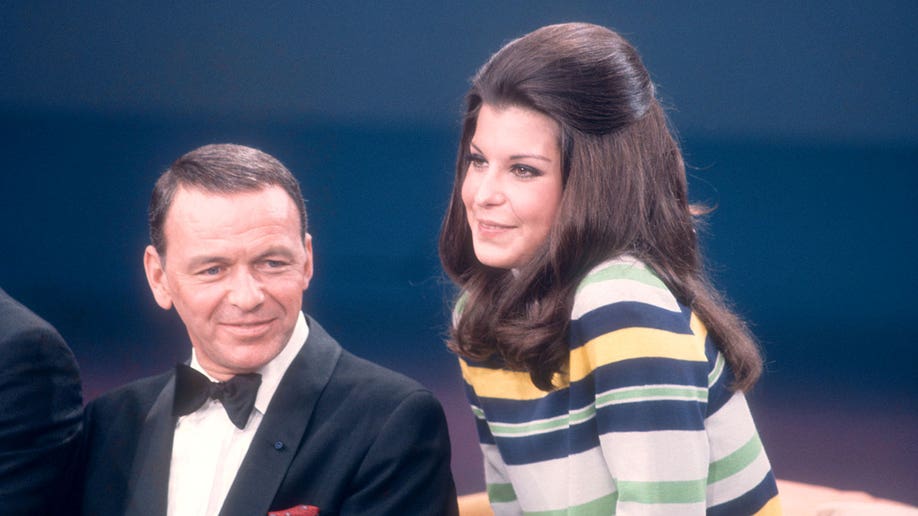 Frank Sinatra with his daughter Tina Sinatra during the taping of 'The Dean Martin Variety Show' in 1967.