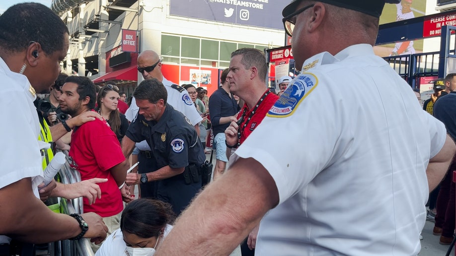 Climate activist outside Nationals Park