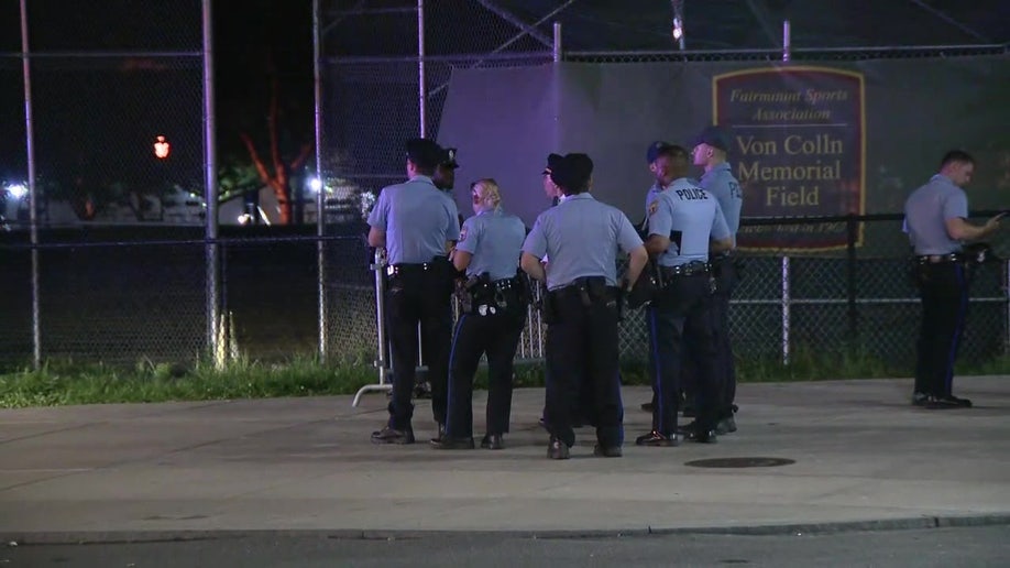 Police huddled after shooting of officer in Philly