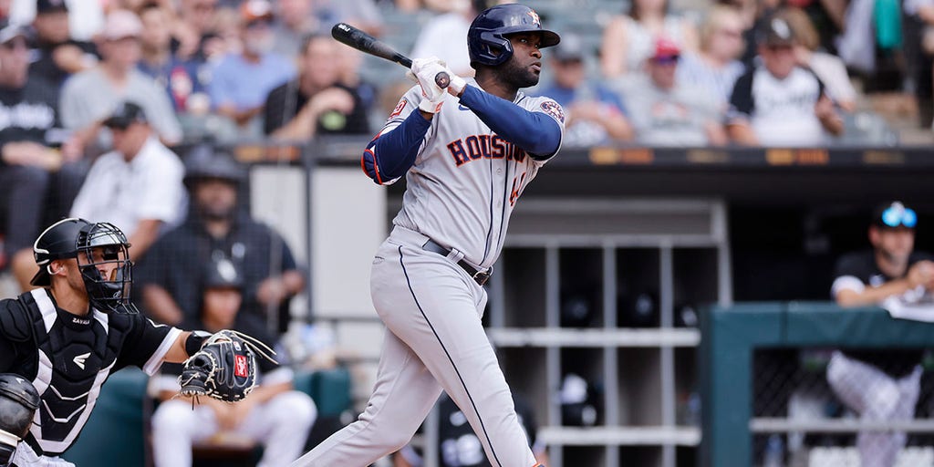 Yordan Alvarez of the Houston Astros flips his bat after hitting a News  Photo - Getty Images