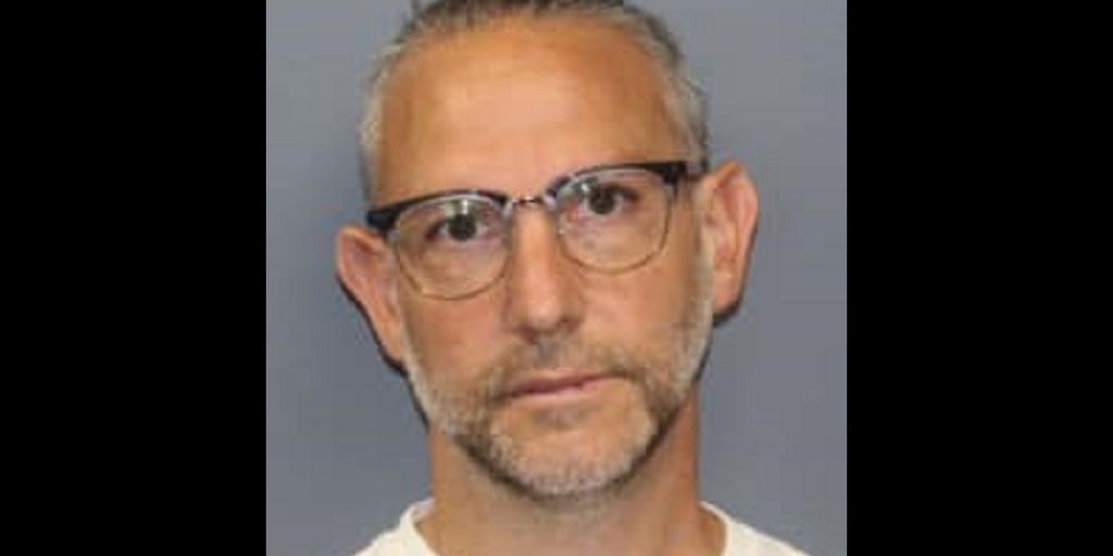 New Jersey hospital worker arrested after 'large cache of rifles, shotguns, handguns' found inside office - Vimarsana News