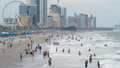 Crowds enjoy the beach on May 29, 2021 in Myrtle Beach, S.C.