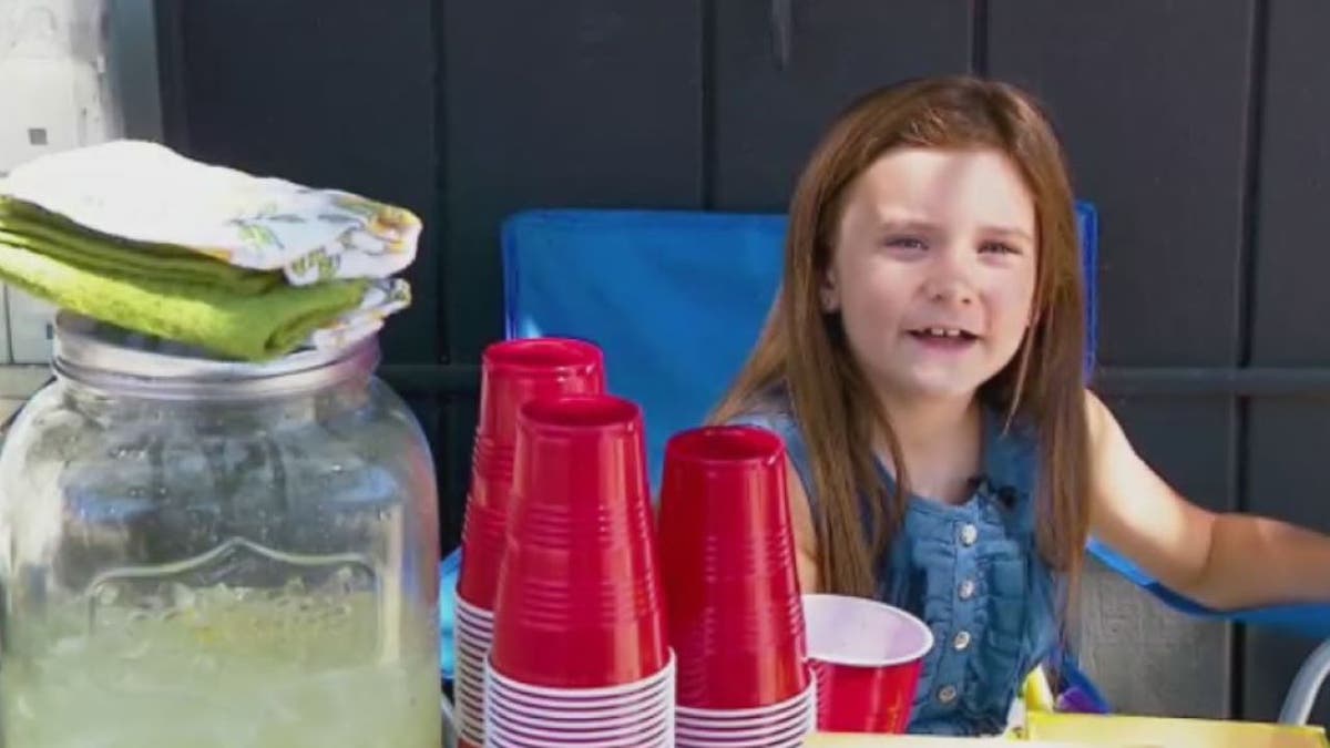 8-year-old Asa Baker selling lemonade