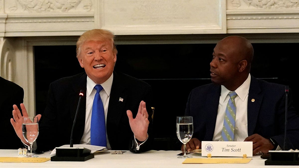 Donald Trump and Tim Scott during a meeting