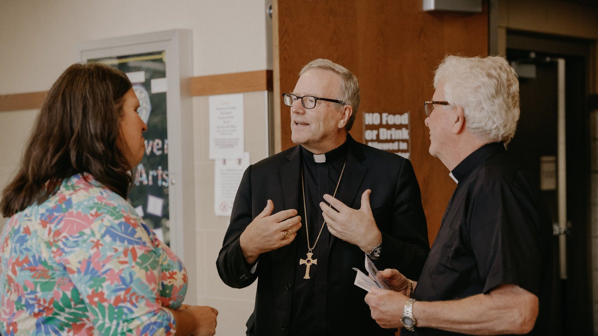 Bishop Robert Barron of the Diocese of Winona-Rochester, Minnesota (Center)
