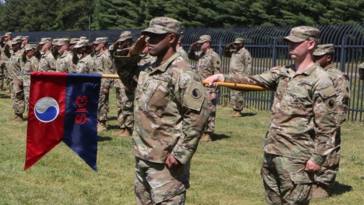 Army National Guard soldiers hold 29th Infantry Division Guidon
