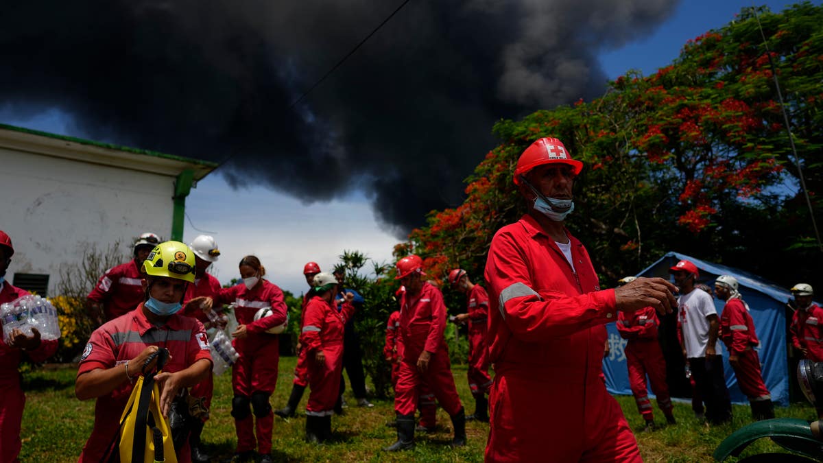 Firefighters attempt to quell fire in Cuba