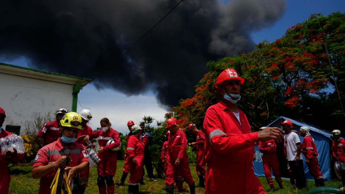 Firefighters attempt to quell fire in Cuba