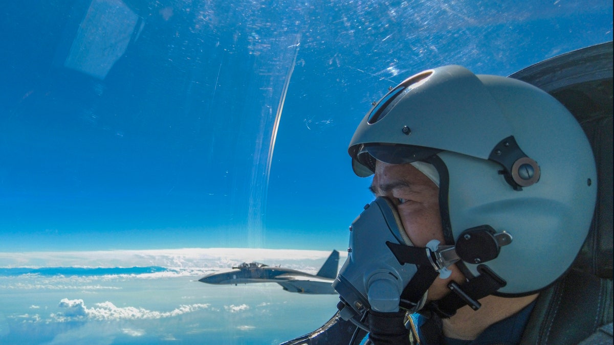 Chinese pilot flying a jet near Taiwan