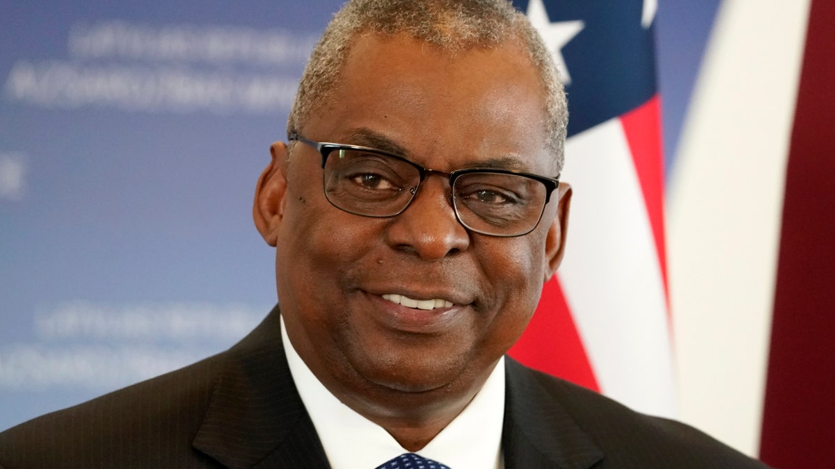 U.S. Secretary of Defense Lloyd Austin smile