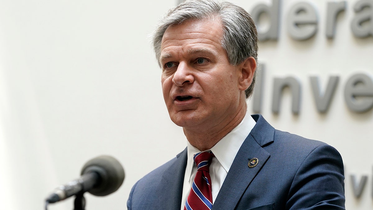 Christopher Wray speaking at an event in Nebraska