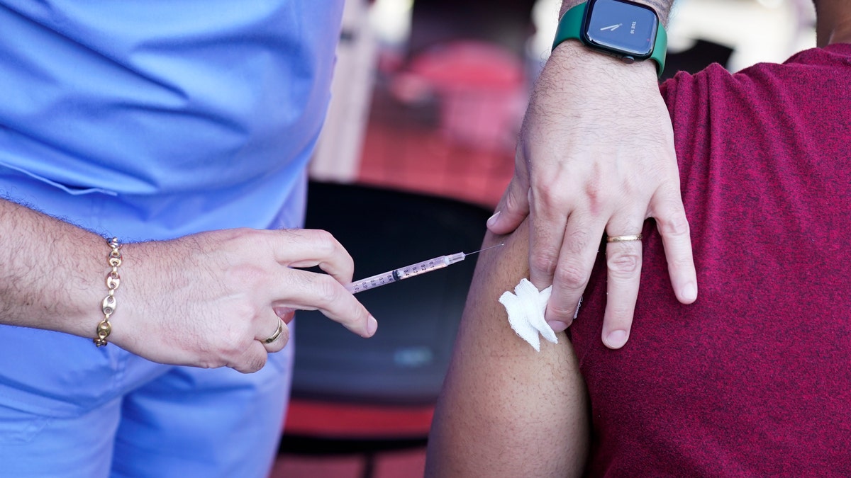  A nurse administers a monkeypox vaccine