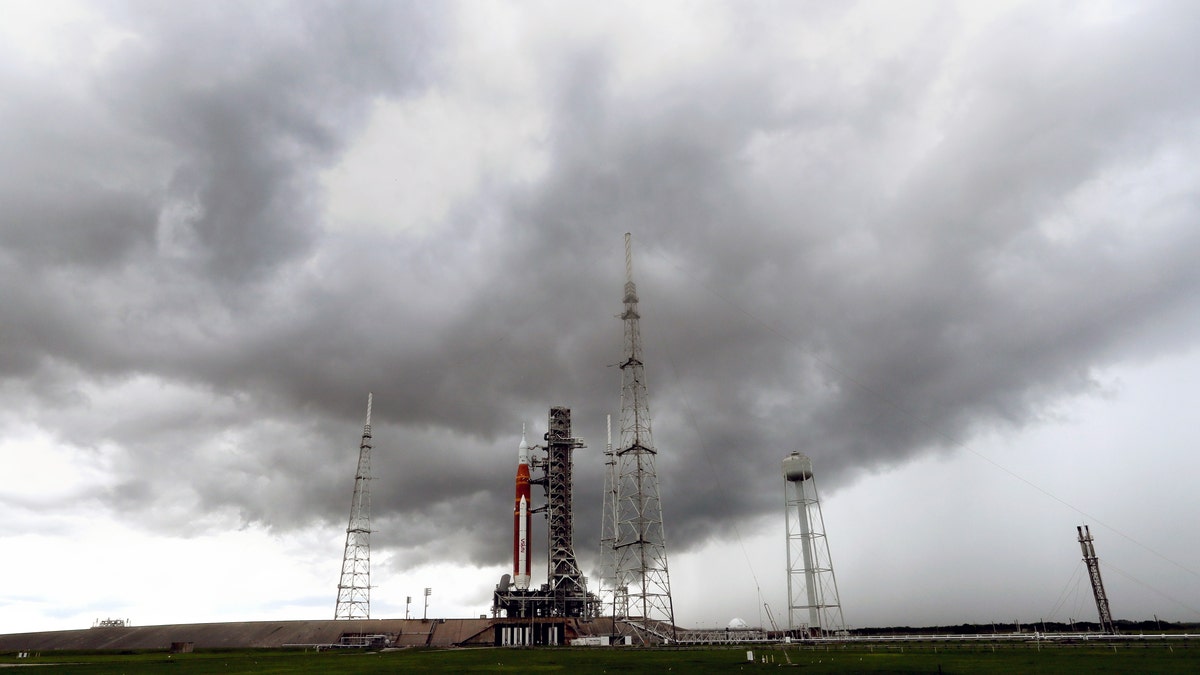 Storm clouds roll in over the NASA moon rocket