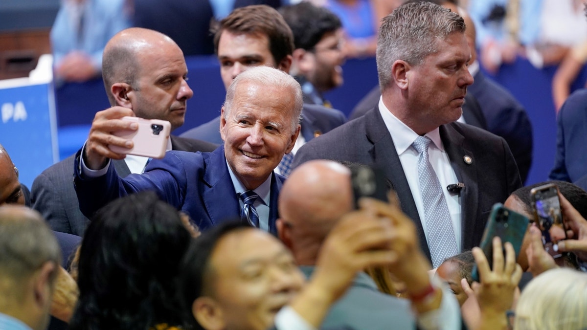 Biden taking a selfie with supporters