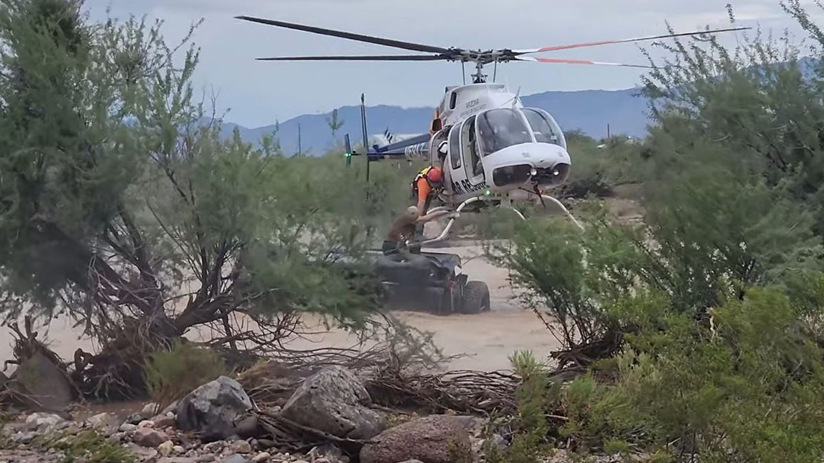 helicopter rescues man