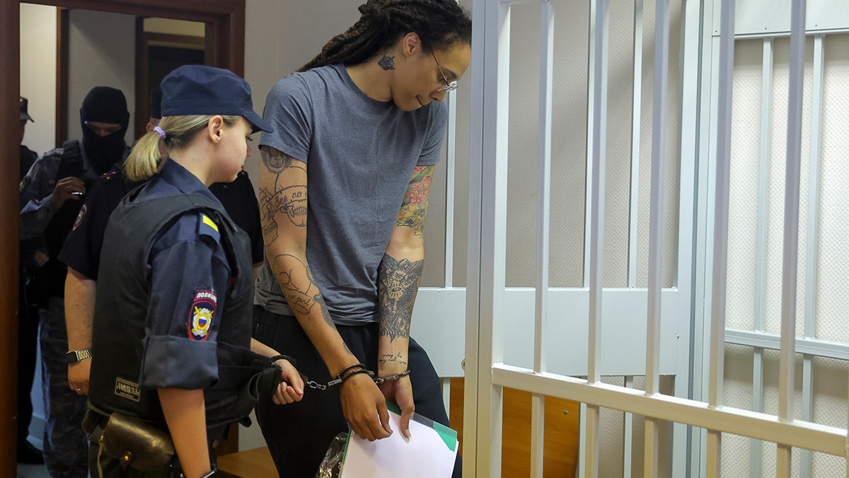 Brittney Griner enters her cell