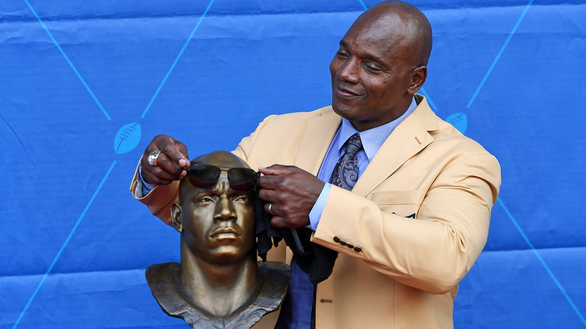 Bryant Young and his HOF bust