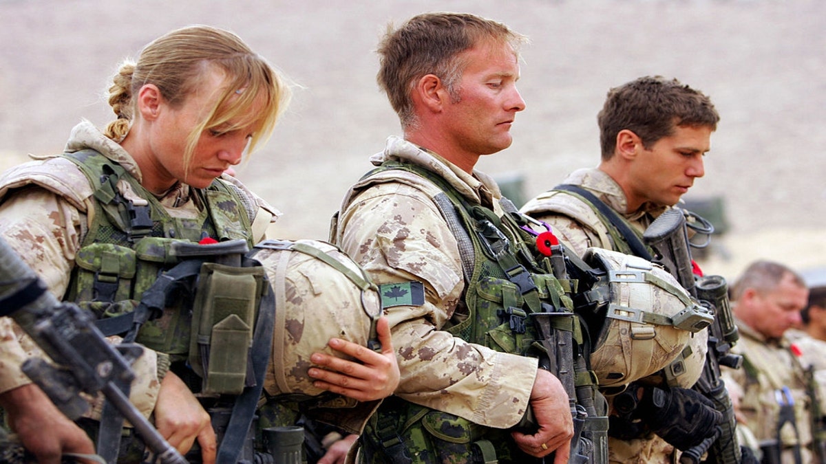 Canadian soldiers during ceremony in Afghanistan