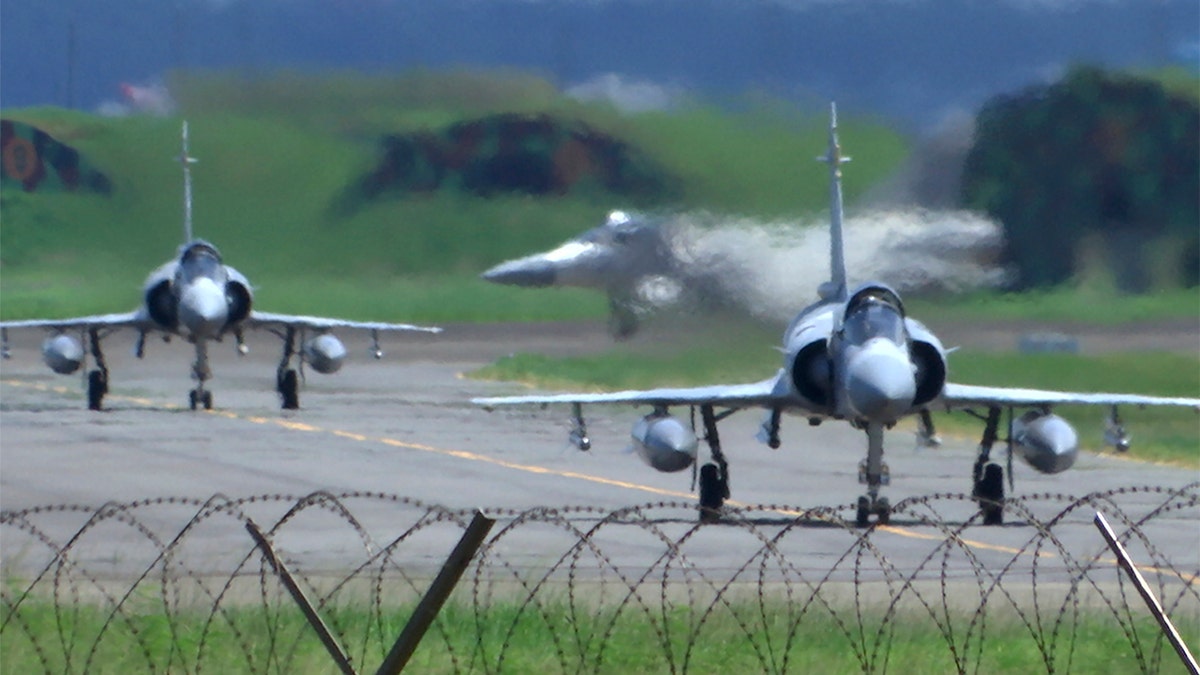 Taiwanese fighter jets taxi at airbase