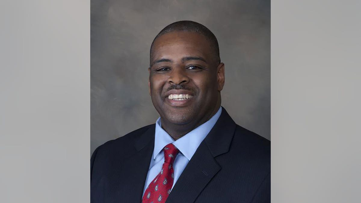 Wisconsin school superintendent Demond Means smiles in official photo