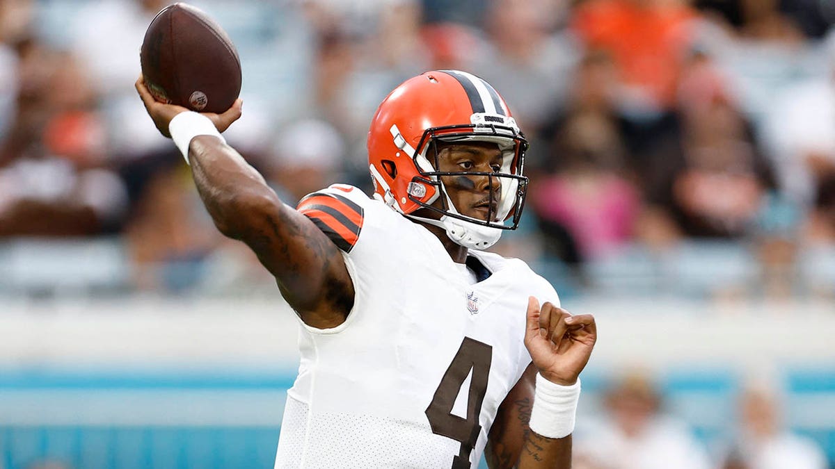 Deshaun Watson throws a football