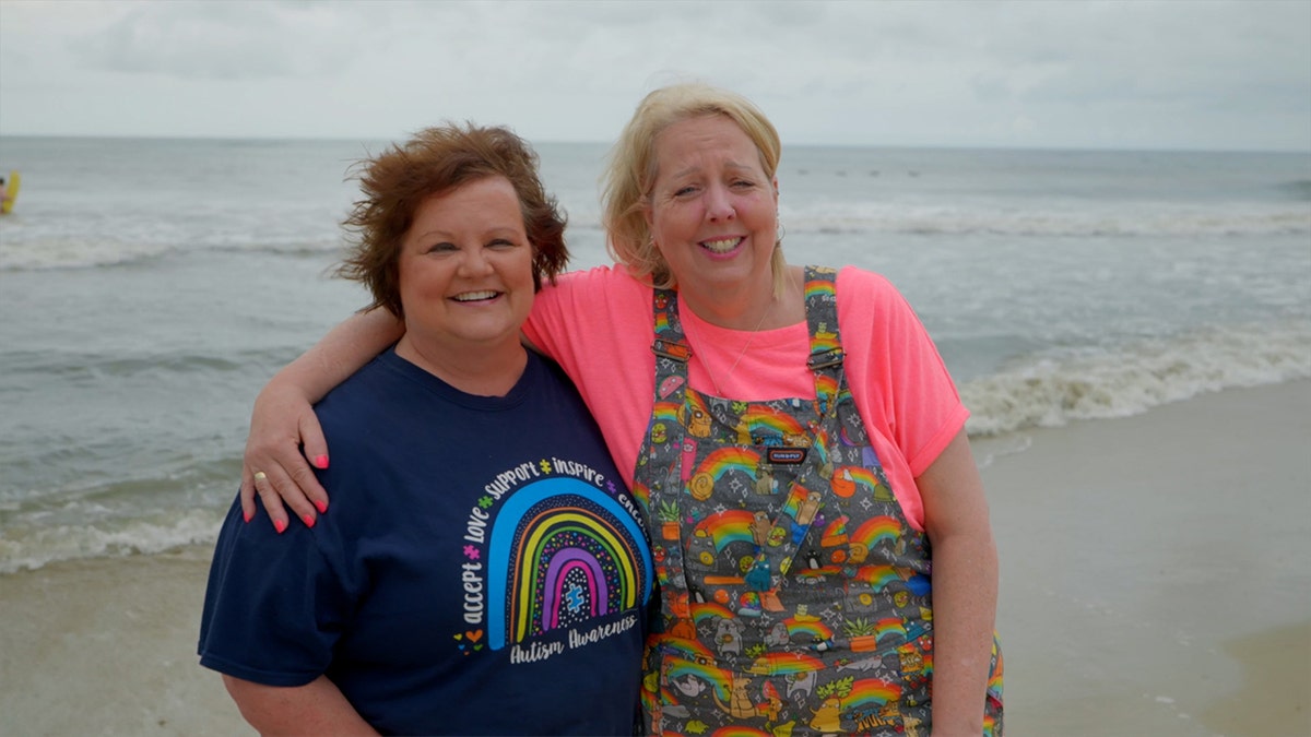 Diane and Mary posing at the beach