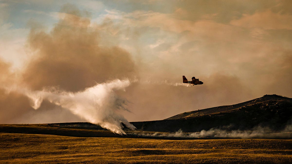 Aircraft dumping water on Elmo Fire