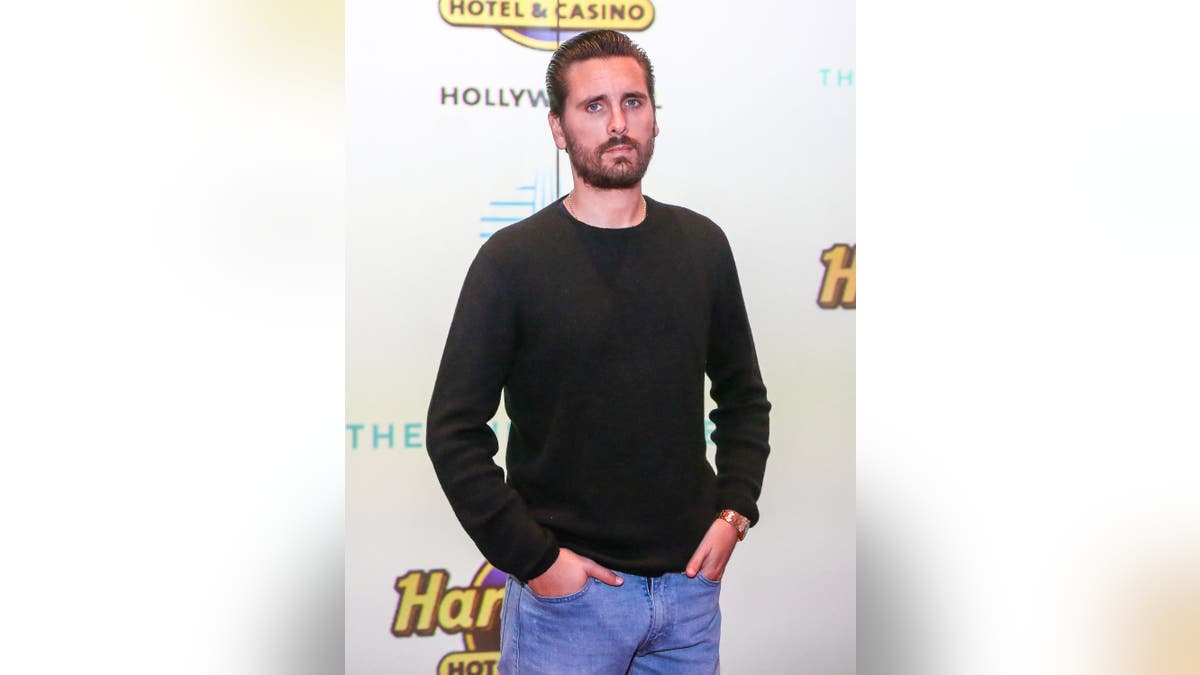 Scott Disick poses