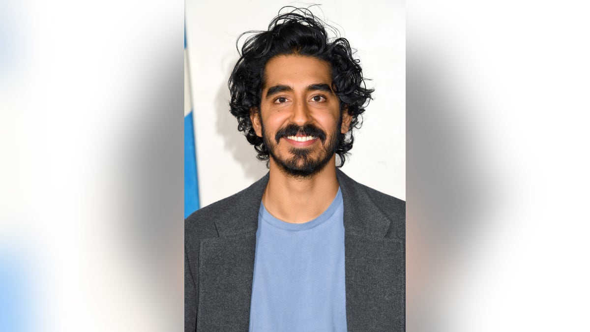 Dev Patel smiling