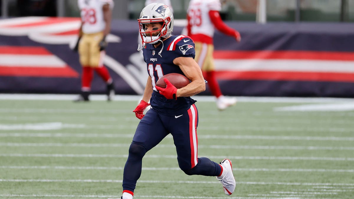 Julian Edelman returns a kick in warmups