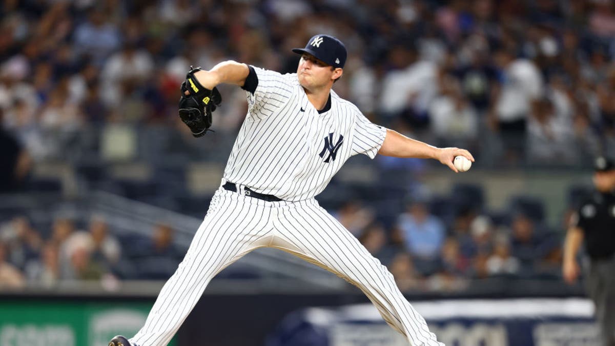 Yankees fan drinks beer through makeshift hot dog straw, divides