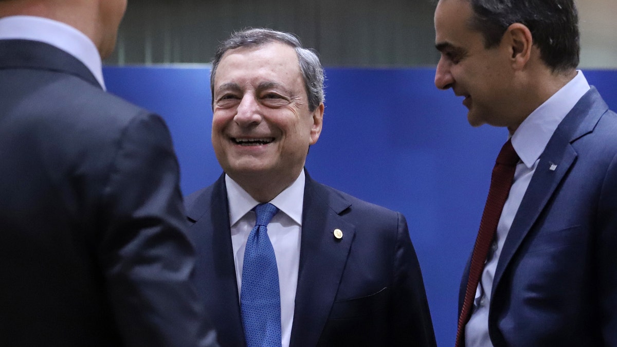 Mario Draghi, Italy's prime minister, left, and Kyriakos Mitsotakis, Greece's prime minister