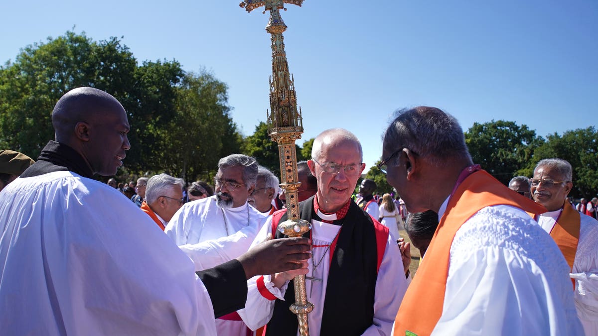 Justin Welby, Archbishop of Canterbury, carrying cross