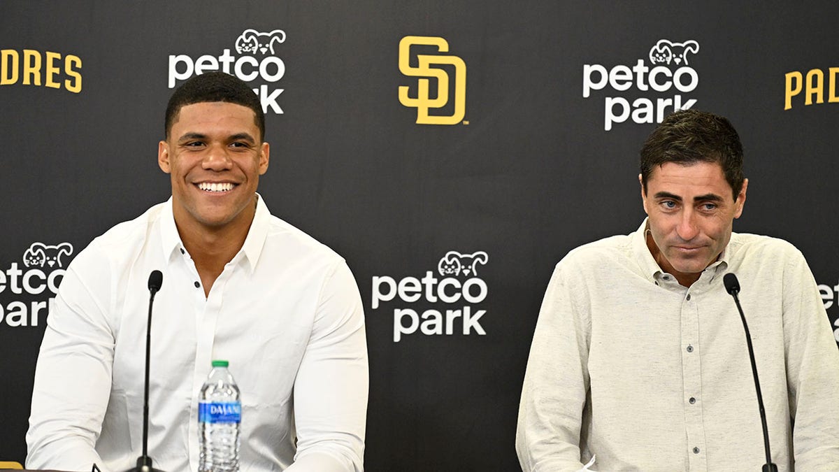 Juan Soto and A.J. Preller at a press conference 