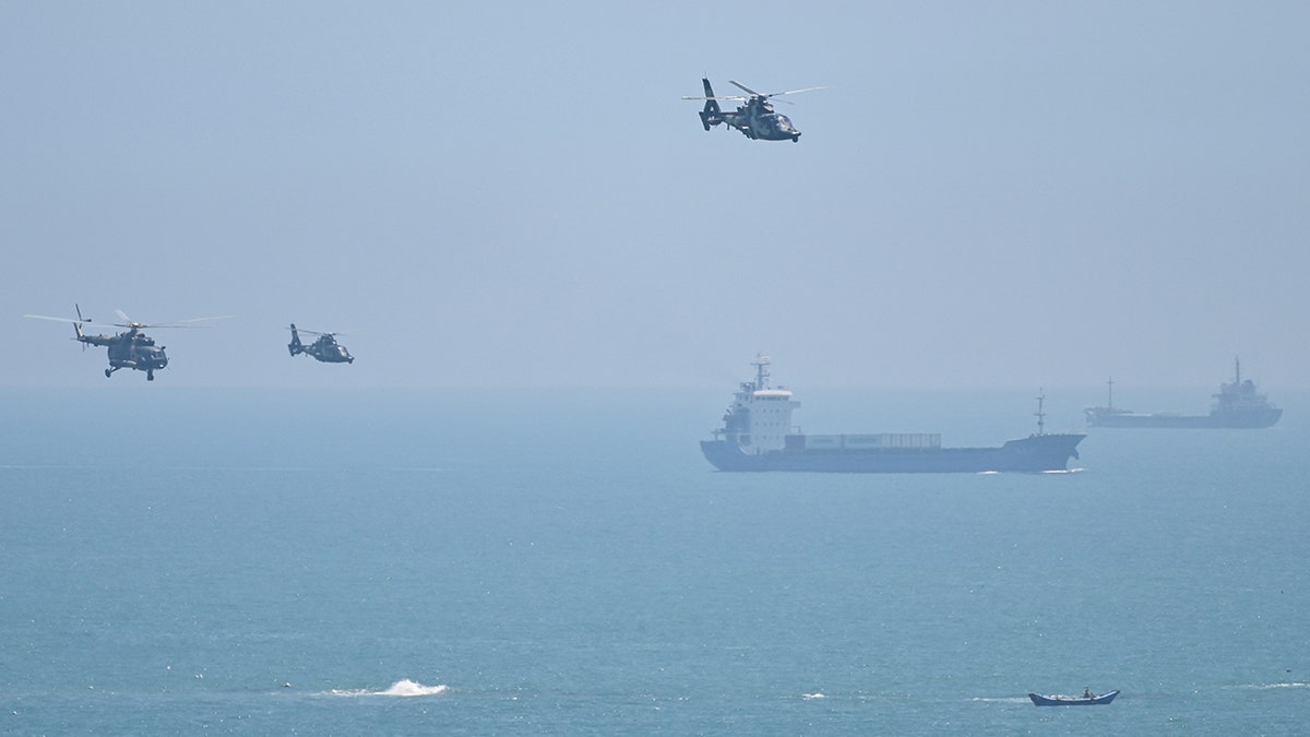 Chinese helicopters and ships in exercise