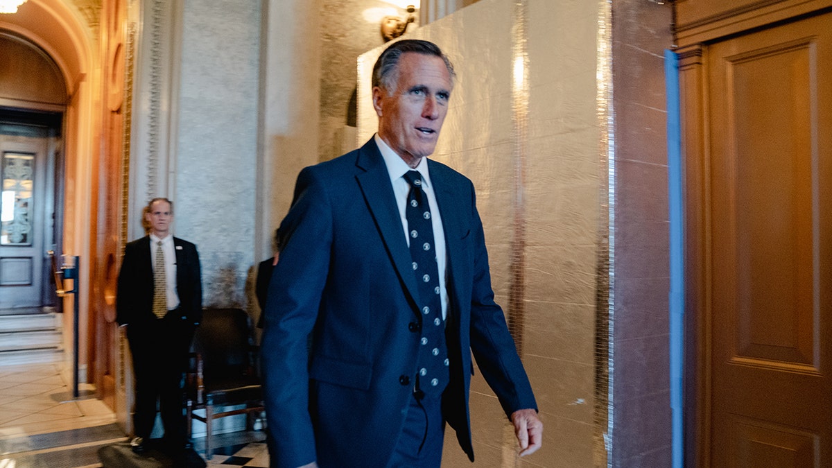 Mitt Romney walking