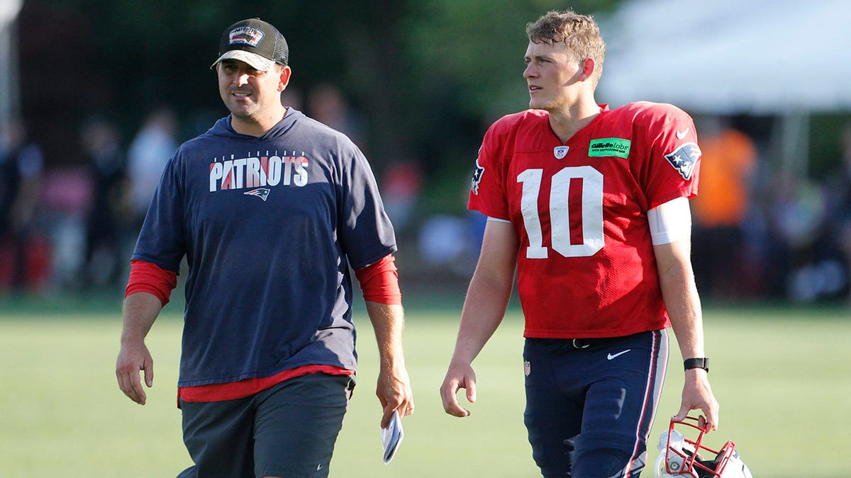 Joe Judge and Mac Jones at training camp