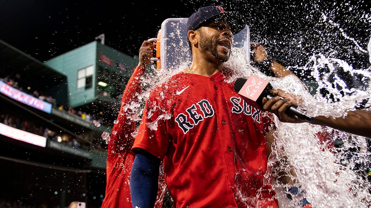 Tommy Pham is doused with water after game winning hit