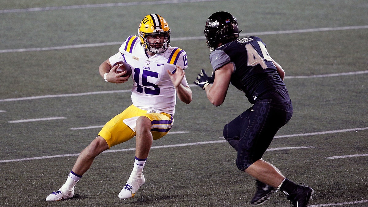 Myles Brennan dodges a tackle